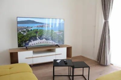 TV i/ili zabavni centar u objektu Little Swiss 2