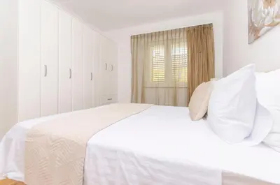 Krevet ili kreveti u jedinici u objektu Apartments Quokka