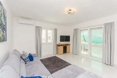 TV i/ili zabavni centar u objektu Apartments Quokka