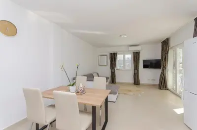 TV i/ili zabavni centar u objektu Apartments Quokka