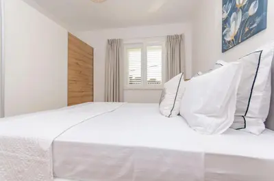 Krevet ili kreveti u jedinici u objektu Apartments Quokka