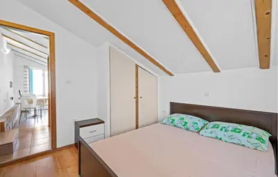 Krevet ili kreveti u jedinici u objektu 1 Bedroom Pet Friendly Apartment In Brodarica