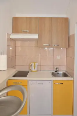Kuhinja ili čajna kuhinja u objektu Apartments Tomas