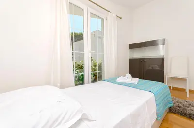 Krevet ili kreveti u jedinici u objektu Apartment Family apartments Ina