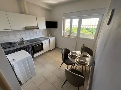 Kuhinja ili čajna kuhinja u objektu Stancic Guest house Vodice