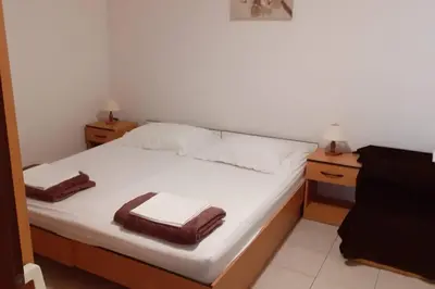 Krevet ili kreveti u jedinici u objektu Apartments by the sea Zaboric, Sibenik - 6097
