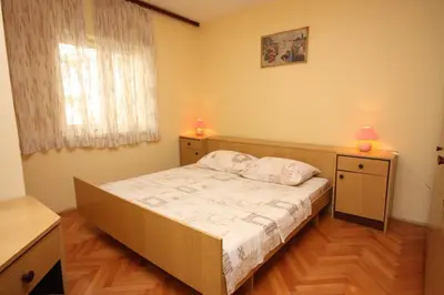 Krevet ili kreveti u jedinici u objektu Apartments by the sea Tisno, Murter - 6106
