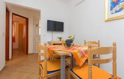 TV i/ili zabavni centar u objektu 1 Bedroom Beautiful Apartment In Srima