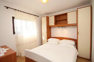 Krevet ili kreveti u jedinici u objektu Apartments by the sea Razanj, Rogoznica - 8361