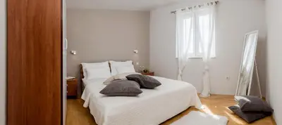 Krevet ili kreveti u jedinici u objektu Apartments and rooms with parking space Rogoznica - 10339