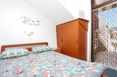 Krevet ili kreveti u jedinici u objektu Family friendly seaside apartments Razanj, Rogoznica - 10373