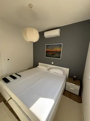 Krevet ili kreveti u jedinici u objektu Alma Mare - Modern Apartment with Soul & View