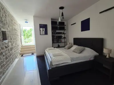 Krevet ili kreveti u jedinici u objektu Saint James Apartment