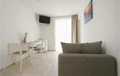 TV i/ili zabavni centar u objektu Nice Apartment In Vodice With Wifi