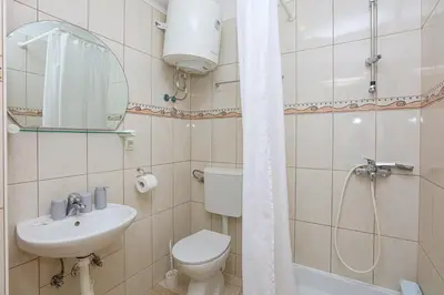 Kupaonica u objektu Apartments with parking space Vodice - 24808
