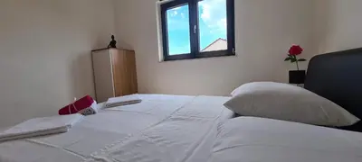 Krevet ili kreveti u jedinici u objektu Apartments Centar