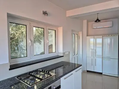 Kuhinja ili čajna kuhinja u objektu Saint Lucy Apartment