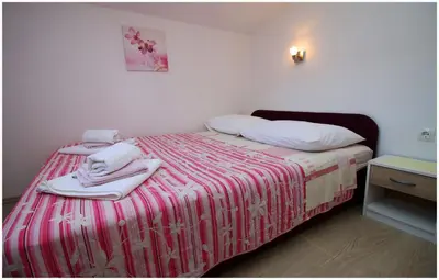 Krevet ili kreveti u jedinici u objektu Apartments Huljev