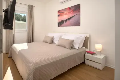 Krevet ili kreveti u jedinici u objektu Hillside Apartment Murter Panorama View