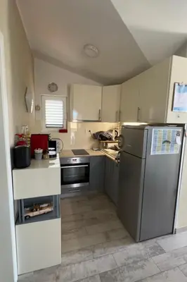 Kuhinja ili čajna kuhinja u objektu Apartments for families with children Vodice - 24913