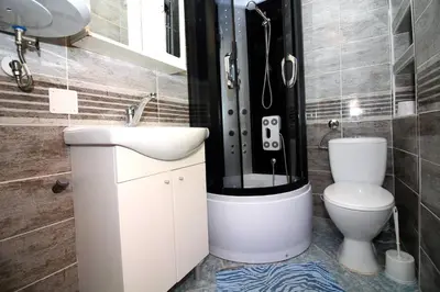 Kupaonica u objektu Holiday House Serov