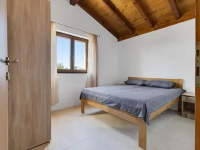 Krevet ili kreveti u jedinici u objektu Holiday Home Agis by Interhome