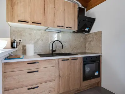 Kuhinja ili čajna kuhinja u objektu Holiday Home Agis by Interhome