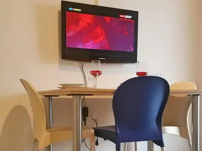 TV i/ili zabavni centar u objektu Apartments Mateo - One Bedroom Apartment - Blue
