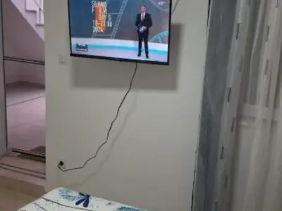 TV i/ili zabavni centar u objektu Studio Apartment Sineva