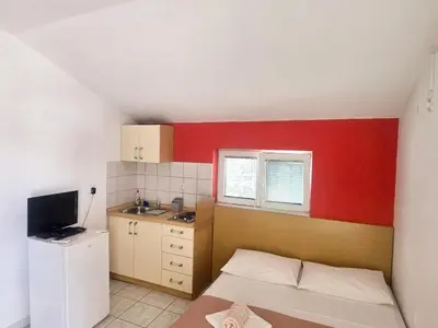 TV i/ili zabavni centar u objektu Apartments Mateo - Studio Apartment - Red