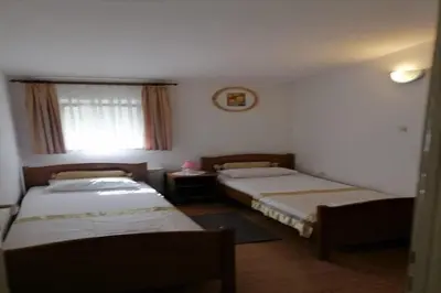 Krevet ili kreveti u jedinici u objektu Apartments Libertas - Two bedroom apartment with Balcony and Sea View - 11