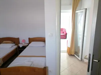 Krevet ili kreveti u jedinici u objektu Apartments Libertas - Two Bedroom Apartment with with Terrace and Sea View 7