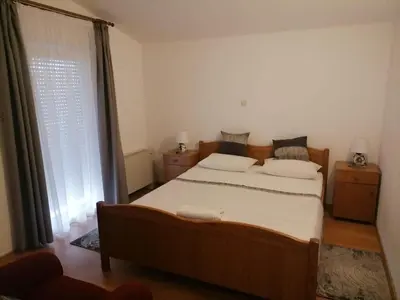Krevet ili kreveti u jedinici u objektu Apartments Libertas - Two Bedroom Apartment with with Terrace and Sea View 12