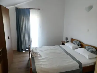 Krevet ili kreveti u jedinici u objektu Apartments Libertas - One Bedroom Apartment with Terrace and Sea View - 5