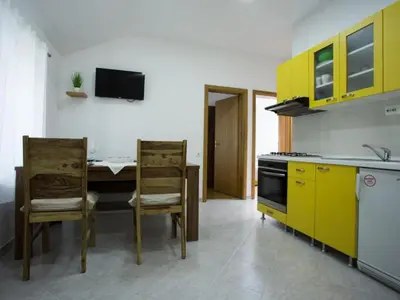 Kuhinja ili čajna kuhinja u objektu Apartments Stone House Murter - Two Bedroom Apartment with Terrace