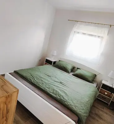 Krevet ili kreveti u jedinici u objektu Apartmány Tisno Marina
