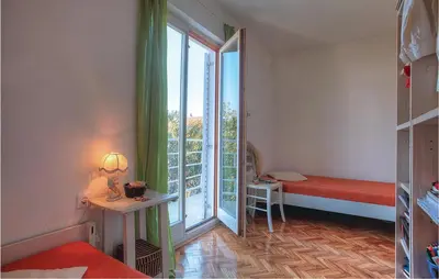 Krevet ili kreveti u jedinici u objektu Holiday Home Murter With Sea View 01