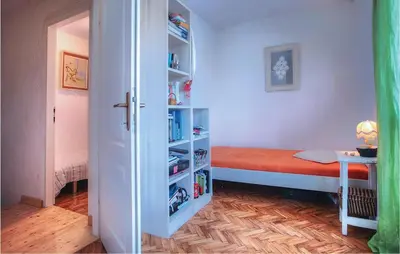 Krevet ili kreveti u jedinici u objektu Holiday Home Murter With Sea View 01