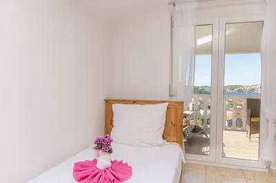 Krevet ili kreveti u jedinici u objektu Apartments Nedi