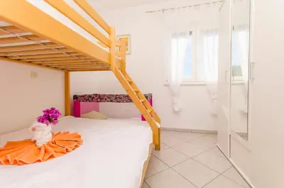 Krevet ili kreveti u jedinici u objektu Apartments Nedi