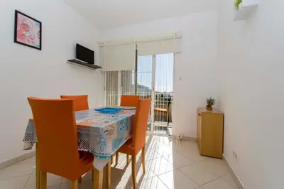 TV i/ili zabavni centar u objektu Apartments Milenko