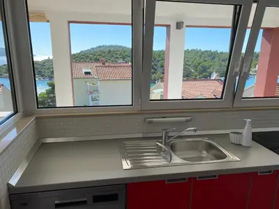 Kuhinja ili čajna kuhinja u objektu Apartman Belamarić