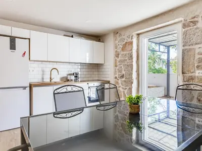 Kuhinja ili čajna kuhinja u objektu Holiday Home Ivanica by Interhome