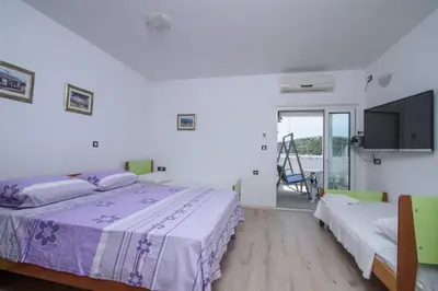 Krevet ili kreveti u jedinici u objektu Apartmani Jerkunica