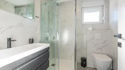 Kupaonica u objektu Holiday home Iva by Villas Guide