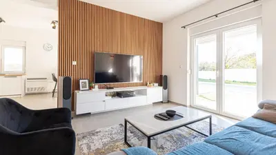 TV i/ili zabavni centar u objektu Holiday home Iva by Villas Guide