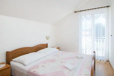 Krevet ili kreveti u jedinici u objektu Apartments Holiday Žaborić