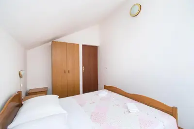Krevet ili kreveti u jedinici u objektu Apartments Holiday Žaborić