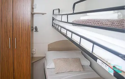 Krevet ili kreveti u jedinici u objektu Gorgeous Stacaravan In Drnis With Wifi