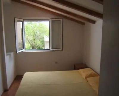 Krevet ili kreveti u jedinici u objektu Apartments Emil